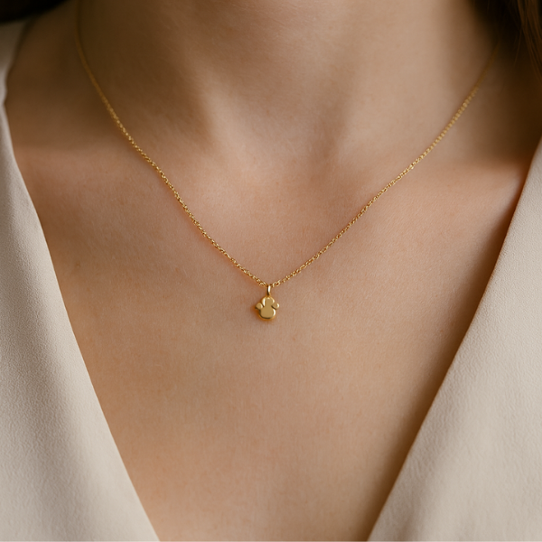 Anhänger Hundepfote 14k am Hals